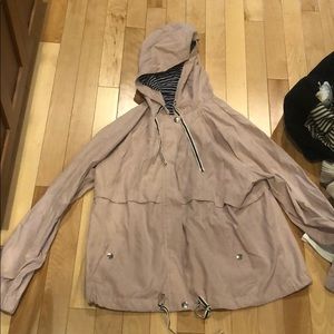 Dusty pink cost, has pockets